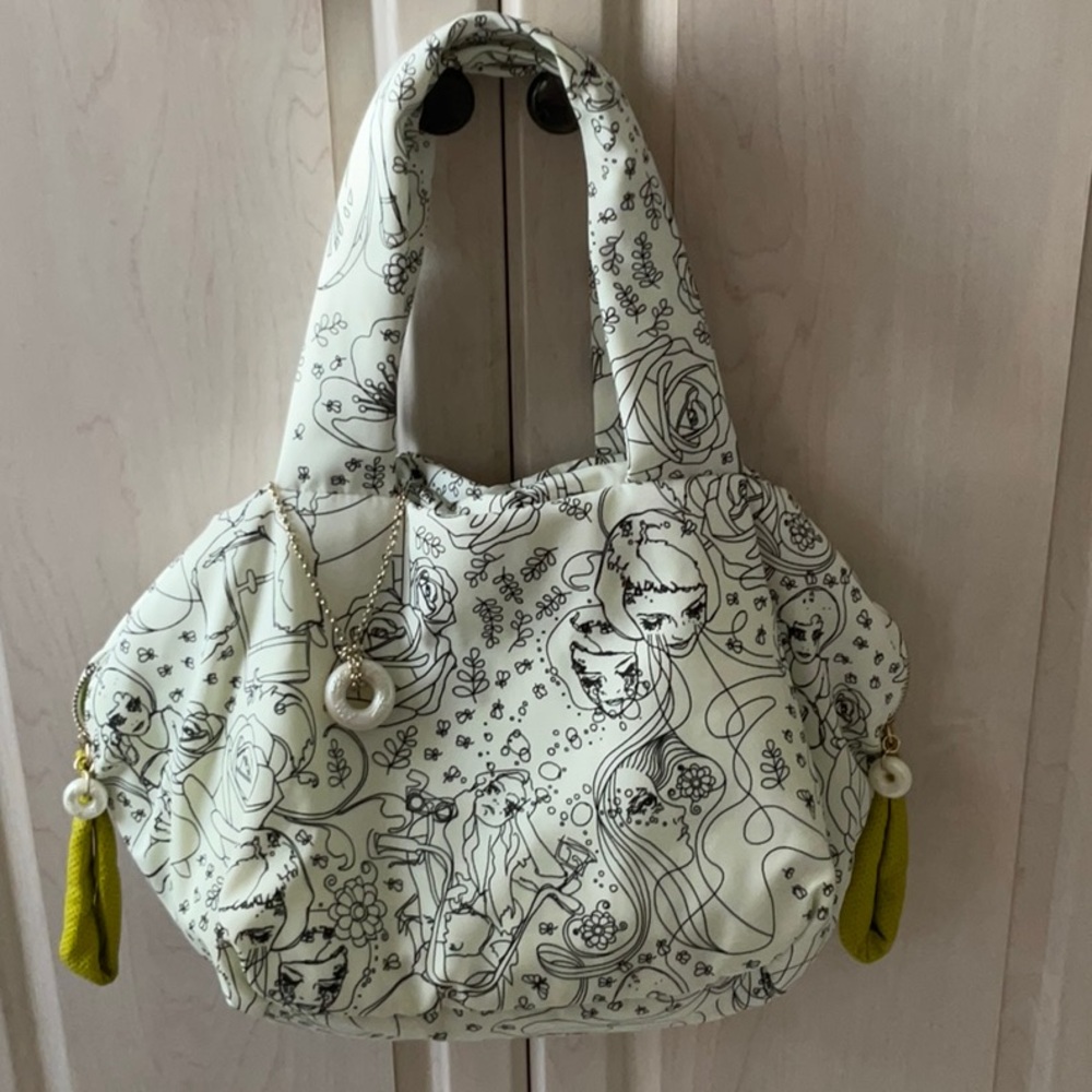 Elegant White and Black Hobo Bags with Paisley Design